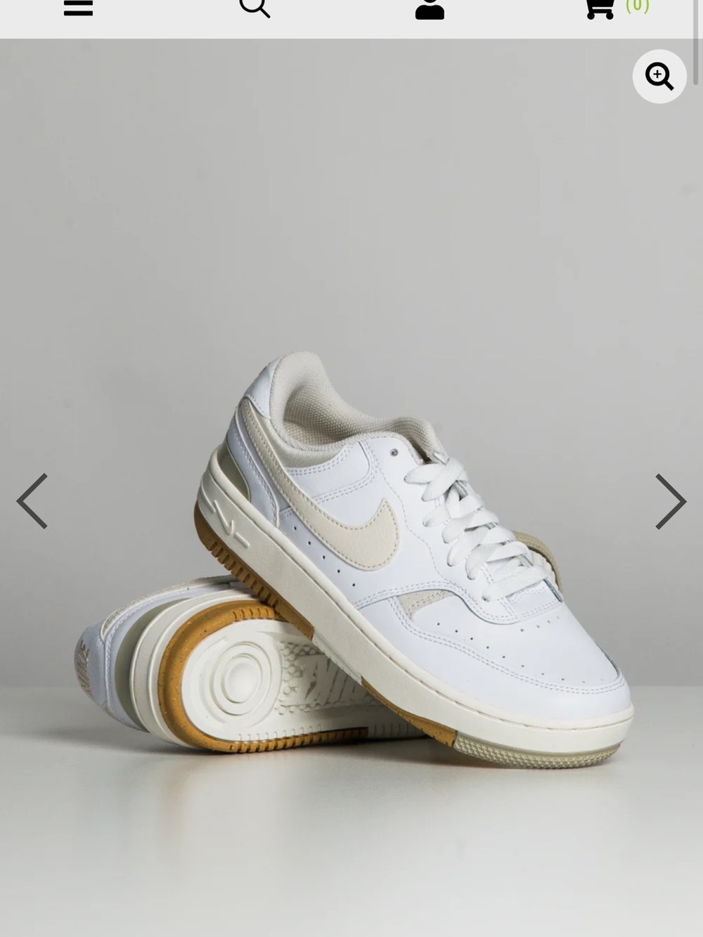 Nike White Low-Top Sneakers with Cream Swoosh